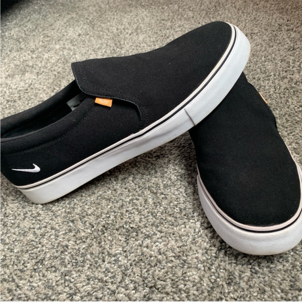 Women’s Black Nike Slip Ons
